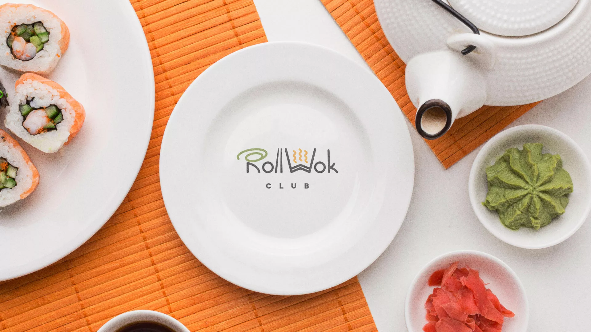 Разработка логотипа и фирменного стиля в Калининграде для суши-бара «Roll Wok Club» Разработка логотипа и фирменного стиля в Калининграде для суши-бара «Roll Wok Club»